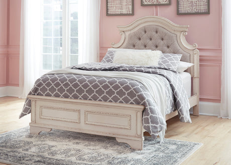 Realyn Full Upholstered Panel Bed